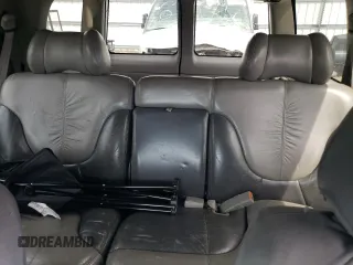 1999 GMC Denali z VIN 1GKEK13R5XR906686, wystawiony jako Copart lot #64451994 z przebiegiem 273 180 mil mil oraz Szkody całkowita. Historia ofert i sprzedaży dostępna na DreamBid. Obrazek 10.