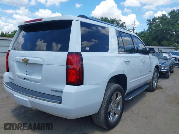 2020 Chevrolet Tahoe LTZ with VIN 1GNSCCKCXLR215899, listed as a IAAI auction lot 40128171 with 109,541 mi miles and . Bid and sale history available at DreamBid. Image 4.