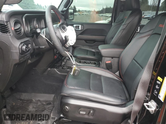 2024 Jeep Wrangler Rubicon X z VIN 1C4RJXFG5RW339591, wystawiony jako Copart lot #50061185 z przebiegiem 3 056 mil mil oraz Szkoda całkowita • Salvage title. Historia ofert i sprzedaży dostępna na DreamBid. Obrazek 7.