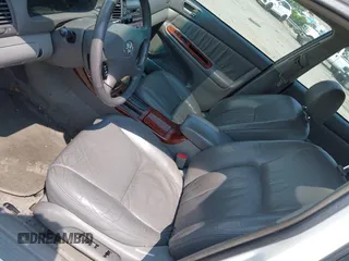 2002 Toyota Camry XLE z VIN 4T1BF30K22U007310, wystawiony jako IAAI lot #42419765 z przebiegiem 206 050 mil mil oraz . Historia ofert i sprzedaży dostępna na DreamBid. Obrazek 15.