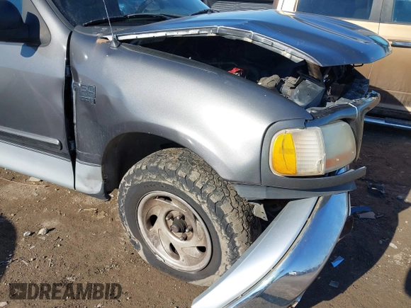2003 Ford F-150 XL with VIN 2FTRX17W63CA93767, listed as a IAAI auction lot 41321830 with Not provided miles and . Bid and sale history available at DreamBid. Image 6.
