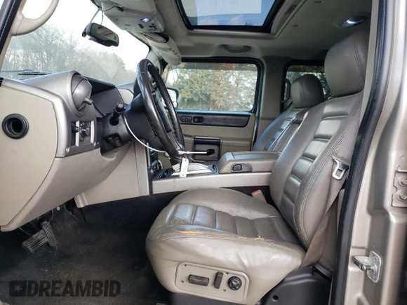 2003 Hummer H2 with VIN 5GRGN23U93H101021, listed as a Copart auction lot 87440524 with 124,826 mi miles and Clean Title. Bid and sale history available at carsss.com. Image 7.