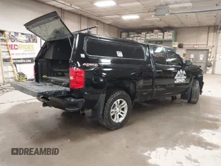 2017 Chevrolet Silverado 1500 Custom with VIN 1GCVKPEC2HZ331214, listed as a IAAI auction lot 40228283 with 132,407 mi miles. Bid and sale history available at carsss.com. Image 4.
