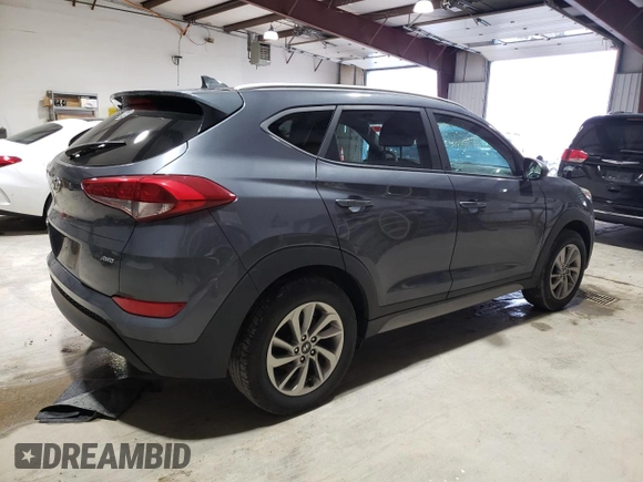 2018 Hyundai Tucson SEL with VIN KM8J3CA40JU600070, listed as a Copart auction lot 52966625 with 119,218 mi miles and Salvage title. Bid and sale history available at DreamBid. Image 3.
