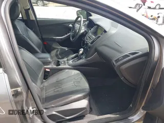 2014 Ford Focus Titanium with VIN 1FADP3N20EL422693, listed as a IAAI auction lot 42060024 with 97,371 mi miles and . Bid and sale history available at DreamBid. Image 5.