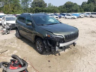2020 Jeep Cherokee Lux with VIN 1C4PJLLX6LD530489, listed as a Copart auction lot 66874094 with 62,696 mi miles and Salvage title. Bid and sale history available at DreamBid. Image 4.