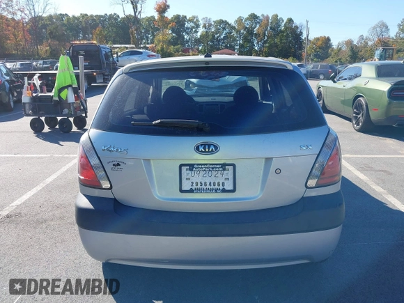 2009 Kia Rio LX with VIN KNADE243696547512, listed as a IAAI auction lot 40639932 with 204,809 mi miles. Bid and sale history available at carsss.com. Image 16.