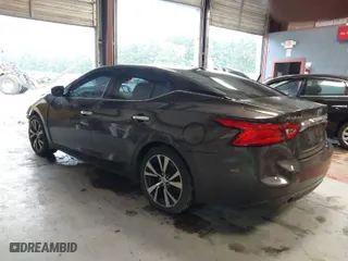 2016 Nissan Maxima 3.5 Platinum with VIN 1N4AA6APXGC447613, listed as a IAAI auction lot 40048427 with 100,142 mi miles. Bid and sale history available at carsss.com. Image 3.