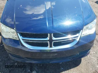 2012 Dodge Grand Caravan SXT with VIN 2C4RDGCGXCR277505, listed as a IAAI auction lot 42194492 with 206,565 mi miles and . Bid and sale history available at DreamBid. Image 6.
