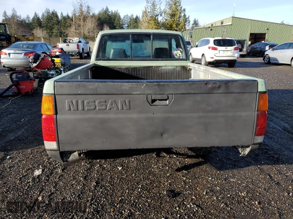 1989 Nissan Hardbody z VIN 1N6ND16S1KC396897, wystawiony jako Copart lot #85928624 z przebiegiem 148 866 mil mil oraz Szkody całkowita. Historia ofert i sprzedaży dostępna na DreamBid. Obrazek 6.