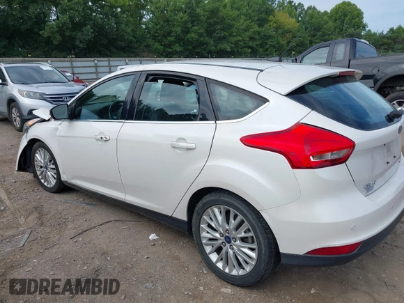 2015 Ford Focus Titanium with VIN 1FADP3N22FL365477, listed as a IAAI auction lot 37461727 with Not provided miles and . Bid and sale history available at DreamBid. Image 3.