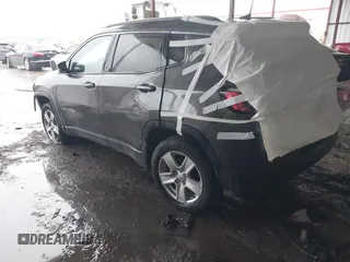 2022 Jeep Compass Latitude with VIN 3C4NJDBB1NT223599, listed as a IAAI auction lot 42181714 with 52,071 mi miles and . Bid and sale history available at DreamBid. Image 3.