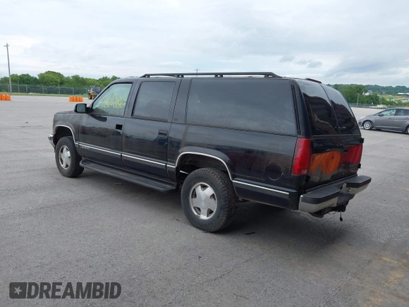 1999 Chevrolet Suburban with VIN 3GNFK16R4XG232727, listed as a IAAI auction lot 42602810 with 121,395 mi miles and . Bid and sale history available at DreamBid. Image 3.