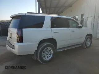 2015 GMC Yukon SLT with VIN 1GKS1BKCXFR563509, listed as a Copart auction lot 77188854 with 127,481 mi miles and Clean Title. Bid and sale history available at carsss.com. Image 3.