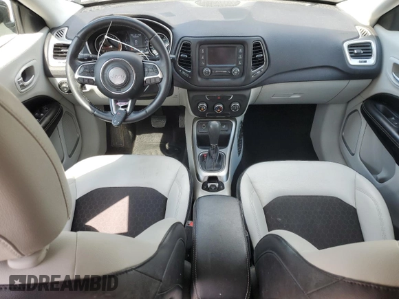 2017 Jeep Compass Latitude with VIN 3C4NJCBB0HT611440, listed as a Copart auction lot 57401485 with 128,319 mi miles and Salvage title. Bid and sale history available at DreamBid. Image 8.