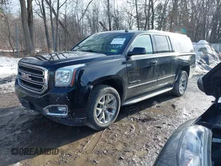 2015 GMC Yukon XL SLT with VIN 1GKS2HKC9FR159164, listed as a IAAI auction lot 41708822 with 136,730 mi miles. Bid and sale history available at carsss.com. Image 17.