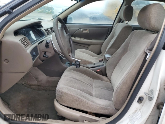 2001 Toyota Camry CE z VIN JT2BG22KX10564294, wystawiony jako Copart lot #53317505 z przebiegiem 227 358 mil mil oraz Szkoda całkowita • Salvage title. Historia ofert i sprzedaży dostępna na DreamBid. Obrazek 7.
