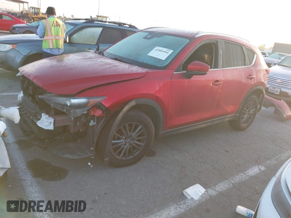 2020 Mazda CX-5 Touring z VIN JM3KFACM1L0855474, wystawiony jako IAAI lot #42004504 z przebiegiem 82 505 mil mil oraz . Historia ofert i sprzedaży dostępna na DreamBid. Obrazek 17.