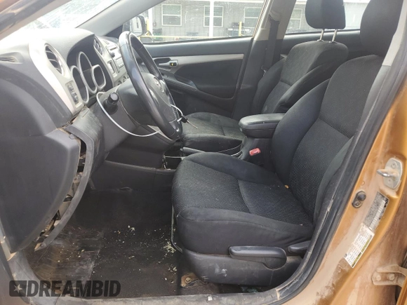 2009 Toyota Matrix S z VIN 2T1KE40E59C013407, wystawiony jako Copart lot #56980755 z przebiegiem 174 973 mil mil oraz Szkoda całkowita • Salvage title. Historia ofert i sprzedaży dostępna na DreamBid. Obrazek 7.