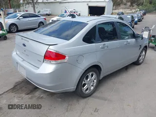 2008 Ford Focus SE with VIN 1FAHP35N18W199448, listed as a IAAI auction lot 42088860 with 174,391 mi miles. Bid and sale history available at carsss.com. Image 4.