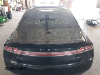 2013 Lincoln MKZ z VIN 3LN6L2G94DR823887, wystawiony jako IAAI lot #42054666 z przebiegiem 101 866 mil mil oraz . Historia ofert i sprzedaży dostępna na DreamBid. Obrazek 17.