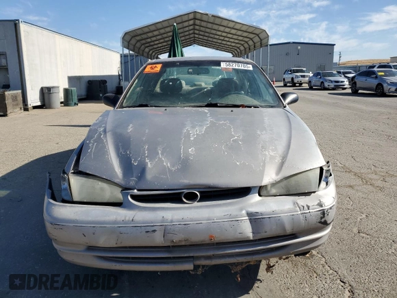 1998 Toyota Corolla VE with VIN 1NXBR12E3WZ093073, listed as a Copart auction lot 58270705 with 303,875 mi miles and Salvage title. Bid and sale history available at DreamBid. Image 5.
