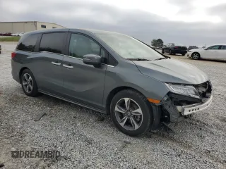 2018 Honda Odyssey Touring with VIN 5FNRL6H8XJB071561, listed as a Copart auction lot 51842215 with 63,828 mi miles and Salvage Title. Bid and sale history available at carsss.com. Image 4.