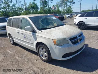 2012 Dodge Grand Caravan SE with VIN 2C4RDGBG2CR174225, listed as a IAAI auction lot 42027552 with 29,718 mi miles. Bid and sale history available at carsss.com. Image 1.