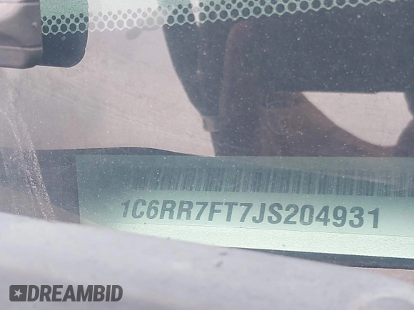 2018 Ram 1500 Tradesman z VIN 1C6RR7FT7JS204931, wystawiony jako IAAI lot #41520204 z przebiegiem 157 398 mil mil oraz . Historia ofert i sprzedaży dostępna na DreamBid. Obrazek 9.