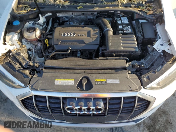 2019 Audi Q3 Premium with VIN WA1AECF38K1076355, listed as a Copart auction lot 74242994 with 86,594 mi miles and Salvage Title. Bid and sale history available at carsss.com. Image 12.