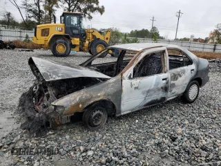 1996 Nissan Sentra XE z VIN 3N1AB41D8TL023592, wystawiony jako Copart lot #83434994 z przebiegiem Nie podano mil oraz Nie do naprawy • Non repairable. Historia ofert i sprzedaży dostępna na DreamBid. Obrazek 1.