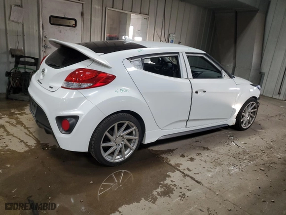 2014 Hyundai Veloster Turbo with VIN KMHTC6AE6EU208574, listed as a Copart auction lot 82103804 with 123,290 mi miles and Clean Title. Bid and sale history available at carsss.com. Image 3.