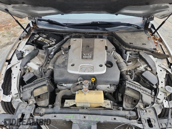 2014 Infiniti Q50 Premium with VIN JN1BV7AP4EM671611, listed as a Copart auction lot 63698505 with 134,904 mi miles and Salvage title. Bid and sale history available at DreamBid. Image 11.