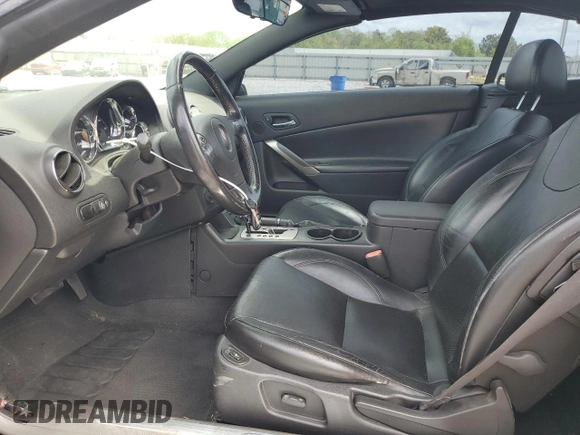 2007 Pontiac G6 GT with VIN 1G2ZH361474107819, listed as a Copart auction lot 52082715 with 137,241 mi miles and Salvage title. Bid and sale history available at DreamBid. Image 7.