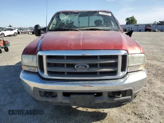 2002 Ford F-250 XL with VIN 1FTNX20F02EB64128, listed as a Copart auction lot 51979895 with 162,117 mi miles and Salvage title. Bid and sale history available at DreamBid. Image 5.