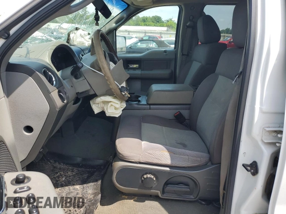 2005 Ford F-150 XLT with VIN 1FTPW14515FA22134, listed as a Copart auction lot 62687005 with 376,363 mi miles and Salvage title. Bid and sale history available at DreamBid. Image 7.