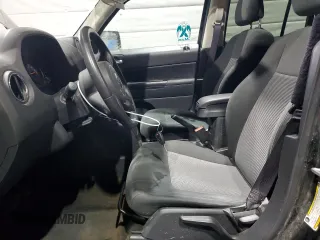 2016 Jeep Patriot High Altitude with VIN 1C4NJRFB8GD802430, listed as a Copart auction lot 50702875 with 151,841 mi miles and Salvage Title. Bid and sale history available at DreamBid. Image 7.