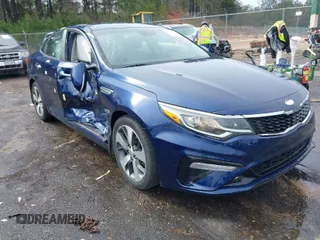 2019 Kia Optima LX with VIN 5XXGT4L37KG361486, listed as a IAAI auction lot 41601404 with 56,891 mi miles. Bid and sale history available at carsss.com. Image 1.