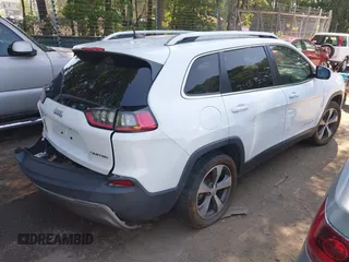 2020 Jeep Cherokee Limited with VIN 1C4PJLDBXLD652811, listed as a IAAI auction lot 42536594 with 93,785 mi miles and . Bid and sale history available at DreamBid. Image 4.
