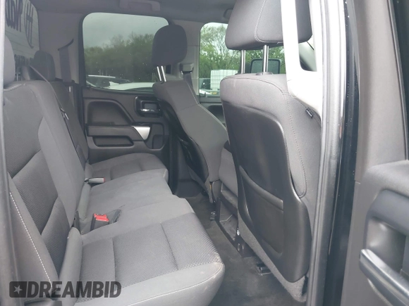 2014 Chevrolet Silverado 1500 LT with VIN 1GCVKREC4EZ327320, listed as a IAAI auction lot 42063939 with 132,317 mi miles and . Bid and sale history available at DreamBid. Image 8.
