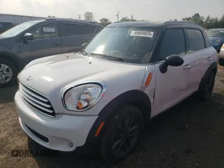 2014 MINI Countryman z VIN WMWZB3C52EWM32133, wystawiony jako Copart lot #59660825 z przebiegiem 106 970 mil mil oraz Szkoda całkowita • Salvage title. Historia ofert i sprzedaży dostępna na DreamBid. Obrazek 1.