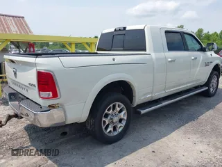 2016 Ram 2500 z VIN 3C6UR5PJ5GG332810, wystawiony jako IAAI lot #42402626 z przebiegiem 220 265 mil mil oraz . Historia ofert i sprzedaży dostępna na DreamBid. Obrazek 4.