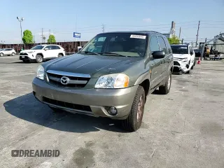 2002 Mazda Tribute LX with VIN 4F2YU08112KM16716, listed as a Copart auction lot 55095645 with 113,885 mi miles and Salvage Title. Bid and sale history available at DreamBid. Image 14.