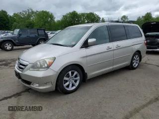 2006 Honda Odyssey Touring z VIN 5FNRL38856B027571, wystawiony jako Copart lot #58588305 z przebiegiem 153 051 mil mil oraz Czysty tytuł • Clean title. Historia ofert i sprzedaży dostępna na DreamBid. Obrazek 1.