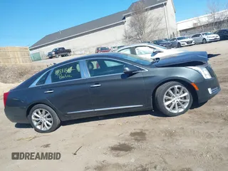 2013 Cadillac XTS Luxury with VIN 2G61R5S32D9223380, listed as a IAAI auction lot 41881602 with 335,780 mi miles. Bid and sale history available at carsss.com. Image 13.