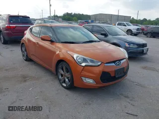 2016 Hyundai Veloster with VIN KMHTC6AD0GU283894, listed as a IAAI auction lot 42075622 with 147,774 mi miles. Bid and sale history available at carsss.com. Image 1.