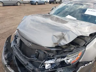 2015 Kia Optima SX Turbo with VIN 5XXGR4A6XFG395441, listed as a IAAI auction lot 41460842 with 140,958 mi miles. Bid and sale history available at carsss.com. Image 10.