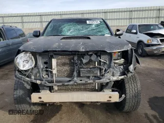 2009 Toyota Tacoma z VIN 3TMLU42N09M030420, wystawiony jako Copart lot #84889784 z przebiegiem 322 393 mil mil oraz Szkoda całkowita • Salvage title. Historia ofert i sprzedaży dostępna na DreamBid. Obrazek 5.