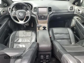 2015 Jeep Grand Cherokee Summit with VIN 1C4RJFJG2FC913658, listed as a Copart auction lot 52160035 with 138,008 mi miles and Salvage Title. Bid and sale history available at DreamBid. Image 8.