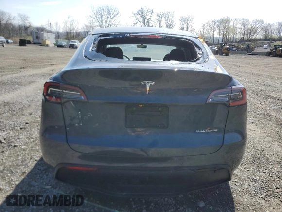 2021 Tesla Model Y Long Range with VIN 5YJYGDEE9MF119974, listed as a Copart auction lot 53794025 with 66,411 mi miles and Salvage Title. Bid and sale history available at DreamBid. Image 6.